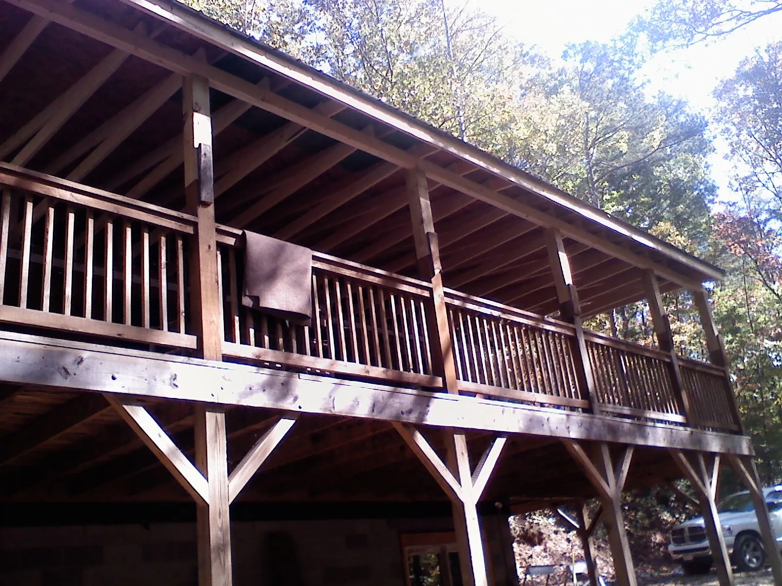 Timber framing under a new elevated porch and deck — Roof Leak Repair in Caret by Roofing Brothers